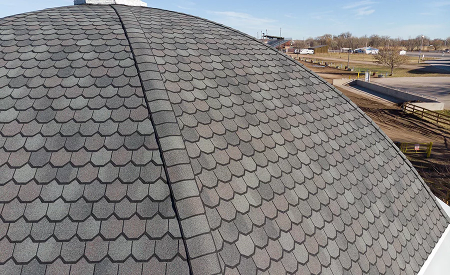 The contractor chose to create a rounded or “fish scale” look, determining that this would help bring an older, aesthetically pleasing architecture to this older building.