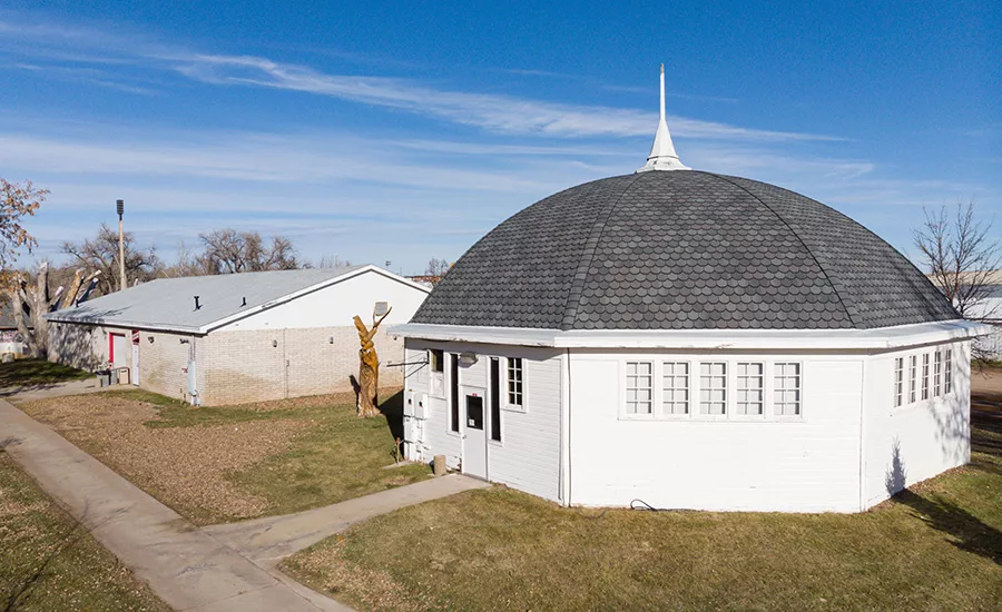 The contractor chose to create a rounded or “fish scale” look, determining that this would help bring an older, aesthetically pleasing architecture to this older building.