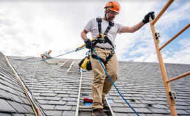 Editor's Note discussing Roofing Contractor magazine's new Safety Advisor eNewsletter (man on roof in harness pictured).