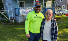 Freedom Roofing, Windows and Siding of Ohio co-owner Brady Donnell with U.S. Army veteran Steven Ickes