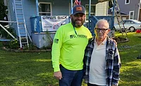 Freedom-Roofing-Donation Freedom Roofing, Windows and Siding of Ohio co-owner Brady Donnell with U.S. Army veteran Steven Ickes