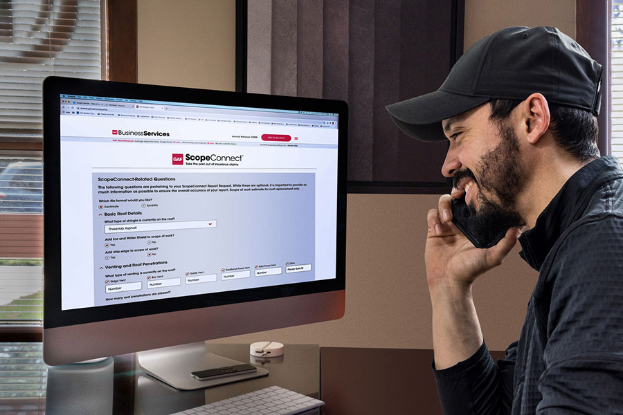 A man sitting at a computer