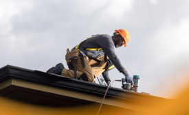 A man working on a roof