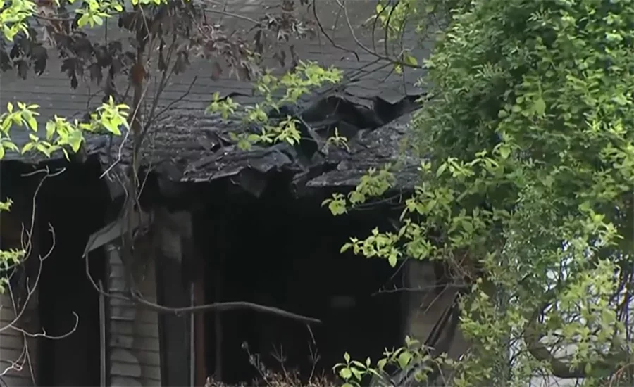 A house fire in Westbrook, Conn., required engines from three towns to bring under control. A firefighter fell through the roof. Two occupants were treated for minor injuries. (Photo of the burned roof.)