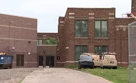 Detroit roofer dies after falling through the roof of a school.