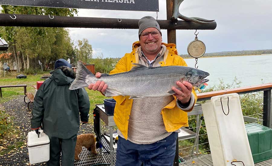 Dennis Bresette holding a large fish
