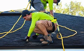 roofers installing a new roof