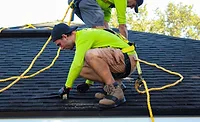 raze-solar-RGkNFjRPyO0-unsplash (1).jpg roofers installing a new roof