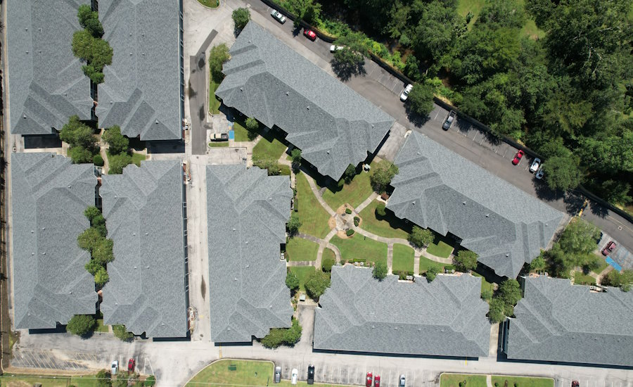 Birds-eye view of several residential houses with new roofs