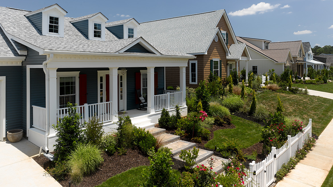 A house with a new roof featuring Solaris shingles by Certainteed