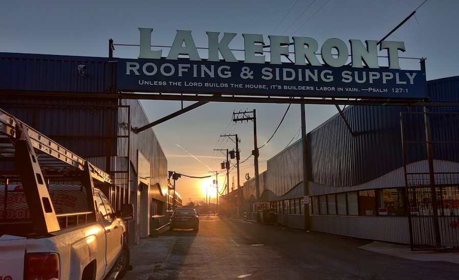 lakefront-roofing-and-supply-entrannce-at-sunrise-with-sign