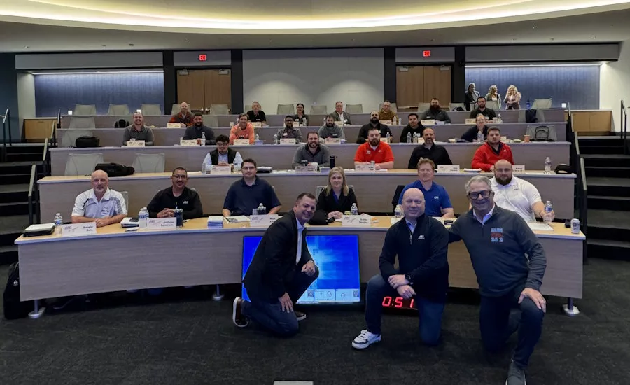 ABC Supply Learning Center classroom with people in seats