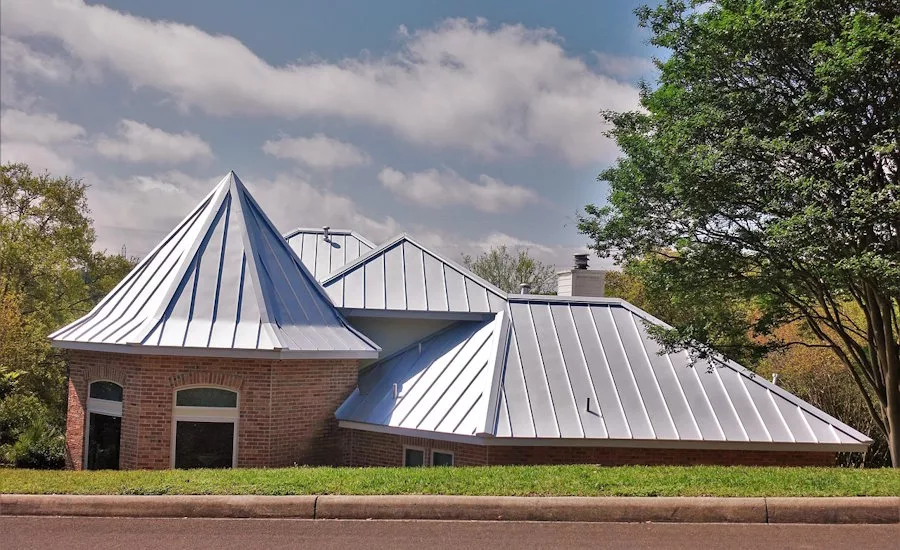 light-colored-metal-roof-on-large-home