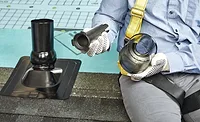 MasterFlowPivotPipeBootFlashing25011-PivotInserts-0116 person-holding-facets-of-GAF-master-flow-pivot-pipe-boot-flashing