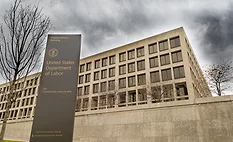 Exterior-view-of-Department-of-Labor-building-with-cloudy-sky