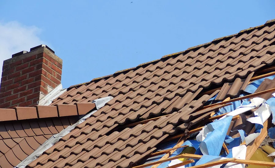 A roof damaged by severe storms