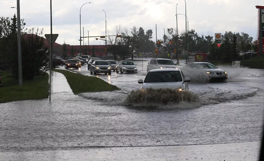 cars-driving-on-a-flooded-street