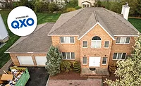 residential-home-overlaid-with-sponsored-by-qxo-sticker