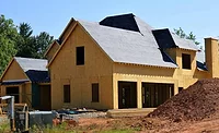 house-under-construction-no-siding-or-full-roof