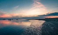 Image by johnwpphillips from Pixabay.jpg Coast at sunset
