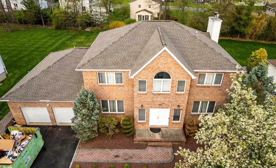 A completed roofing job on a 2 story home