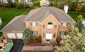 A completed roofing job on a 2 story home