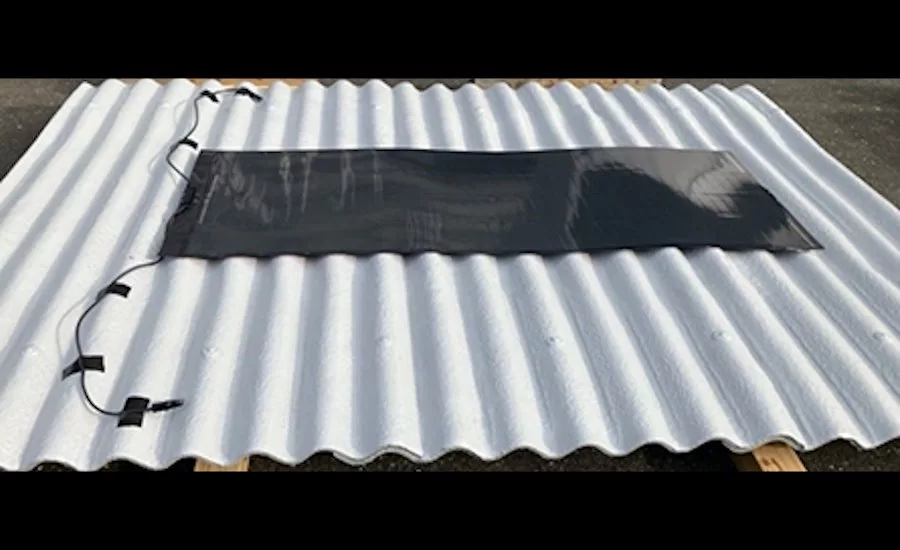 Thin-solar-cell-rolled-onto-mock-roof