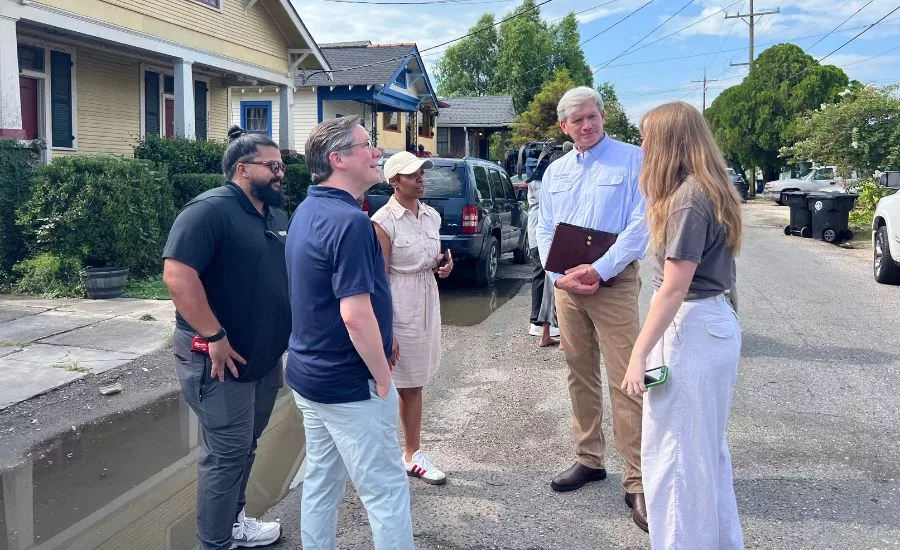 Rebuilding Together New Orleans introduces Louisiana Insurance Commissioner Time Temple and IBHS CEO to roof grant recipient