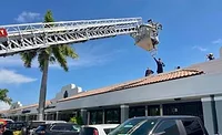 Palm Beach County Fire Rescue.jpg Fire department rescues a roofer from heat exhaustion
