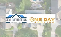 Arial photography of house roofs near green trees