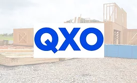 QXO logo overlayed on photo of a residential construction site