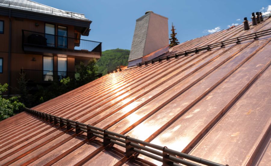Snow guards installed on a copper roof