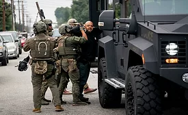 ICE-police-arrest-with-tactical-vehicle