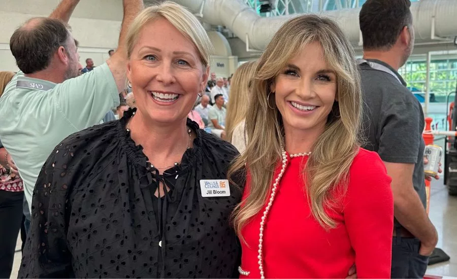 two women at an expo