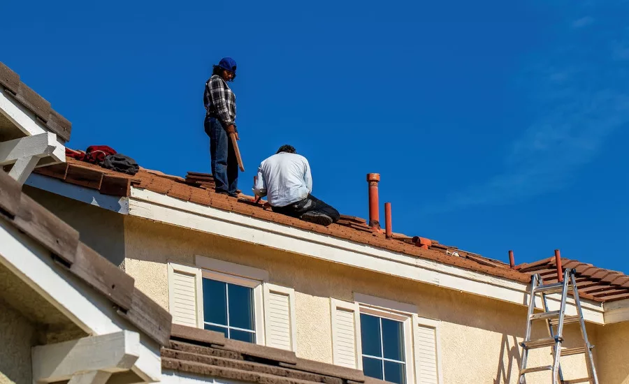 two-workers-on-a-roof
