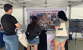 Students-speaking-with-Sharples-under-canopy
