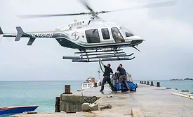helicopter delivering supplies