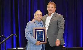 Fred Horner accepts award