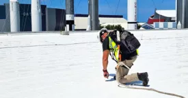 A man working on a roof
