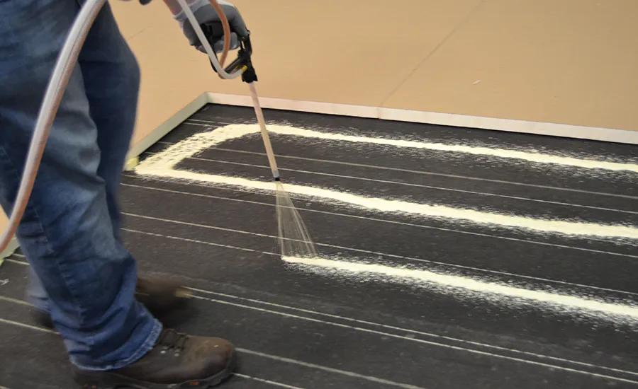 Spraying a Cover Board