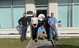 Action Roofing team in front of Pensacola office