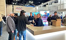 2025-IRE-attendees-at-ABC-Supply-booth