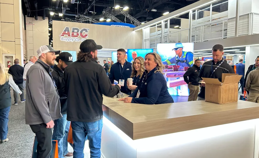 2025-IRE-attendees-at-ABC-Supply-booth