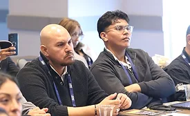 attendees watching a presentation 