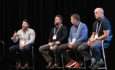 A discussion panel of roofing contractors