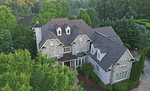 Photo courtesy of Accent Roofing Service A home with a roof