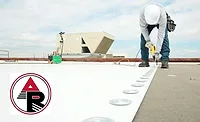 Advanced Roofing.jpg contractor on a commercial roof