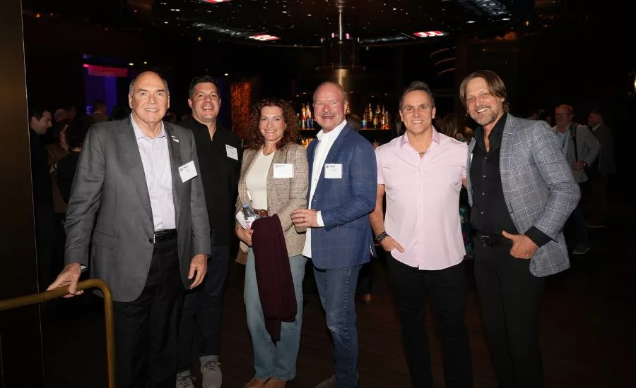 ROOFPAC’s annual auction fundraiser at International Roofing Expo 2026 group at ROOFPAC