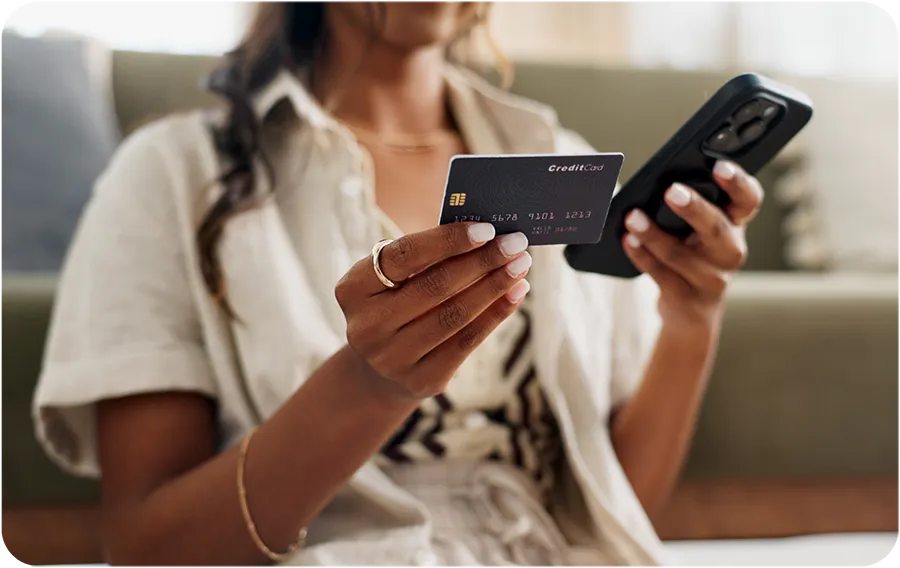 A homeowner holding a credit card