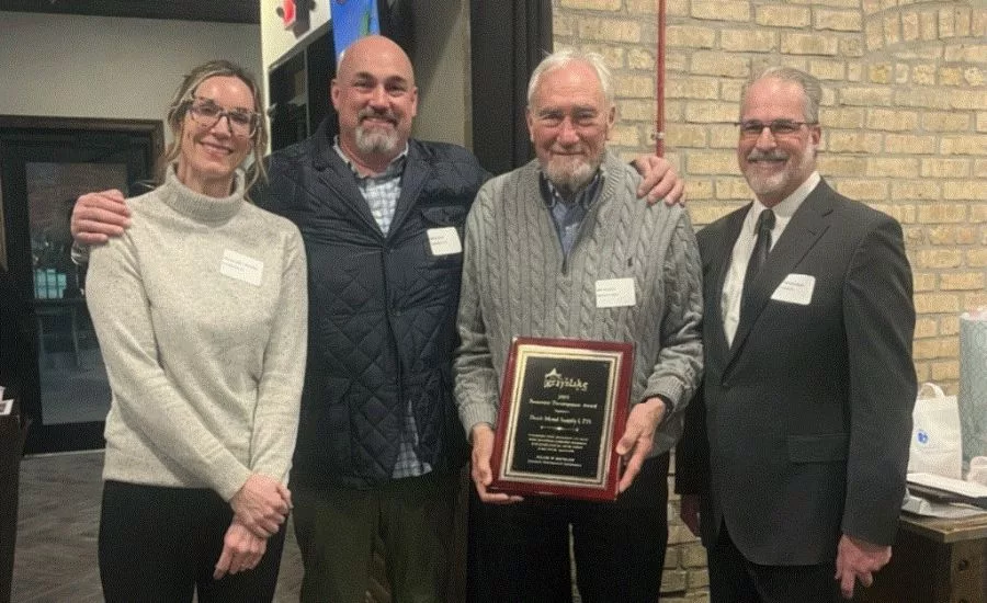 Sheet Metal Supply team accepts award